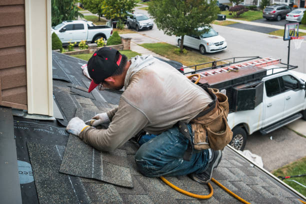 Professional Roofing technician working in Harwood, MD